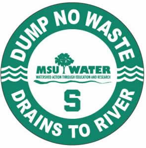 Storm drain label that reads "No dumping; drains to river"